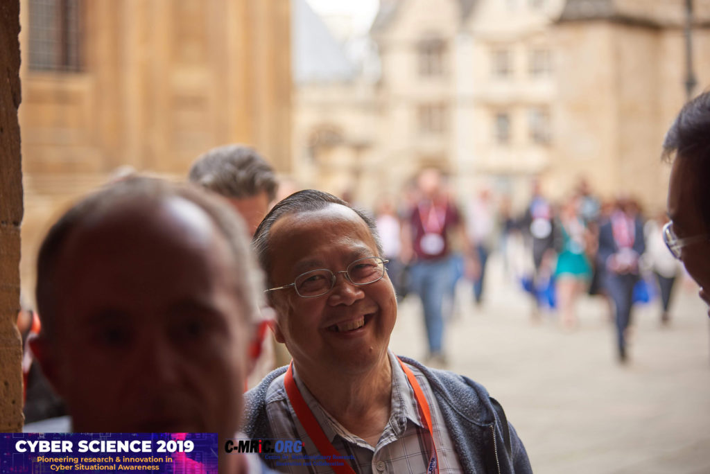 Delegates gathered outside a historic university venue